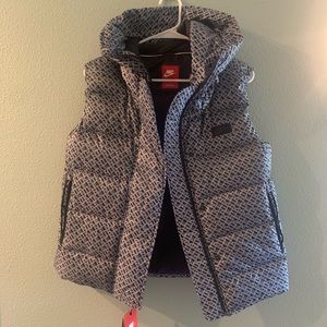 Nike puffer vest, black and grey Nike lettering
